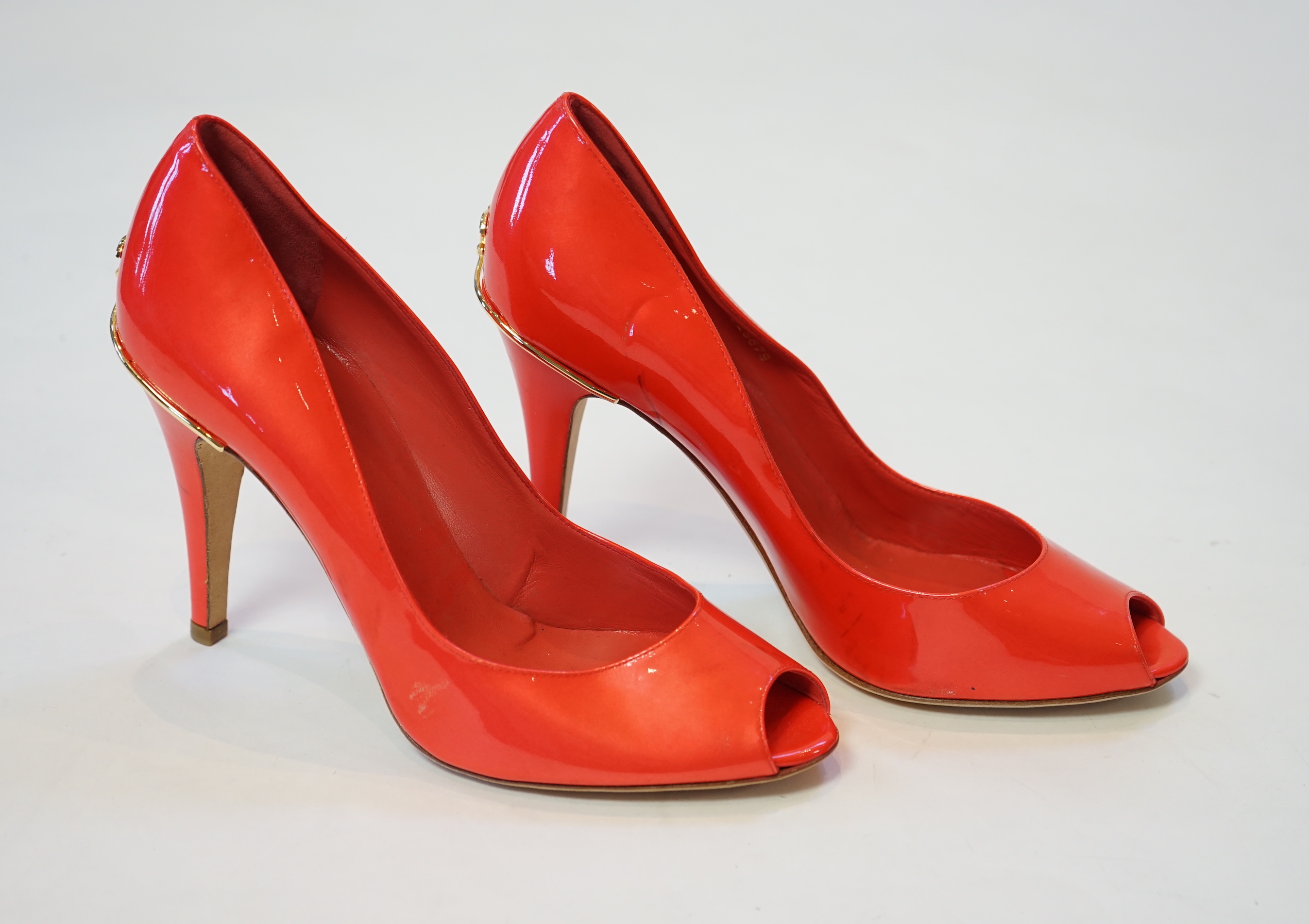 A pair of Chanel lady's metallic coral peep toe patent leather heels, size EU 39.5